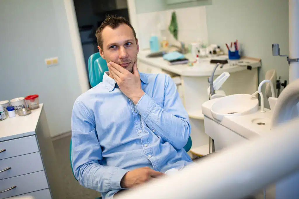 An adult man with fear of the dentist