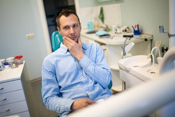 An adult man with fear of the dentist