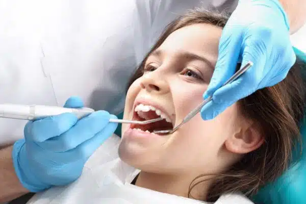 Dental exam showing early tooth decay and cavity risk