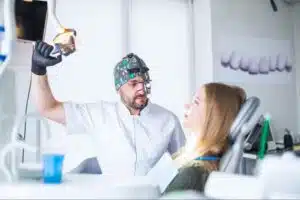 Dentist helping a patient feel calm during dental appointment